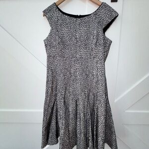 Gabby Skye Black and White Asymmetrical A-line Sleeveless Dress